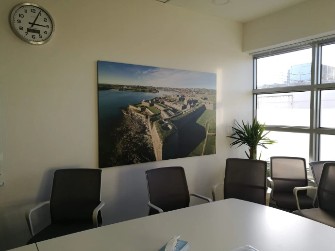 Wall-mounted photo print in office
