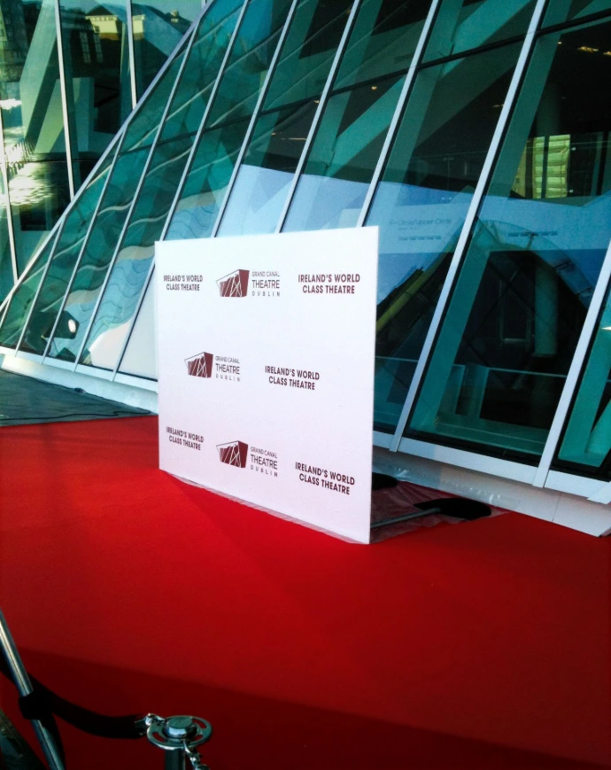 Photo backdrop on red carpet 