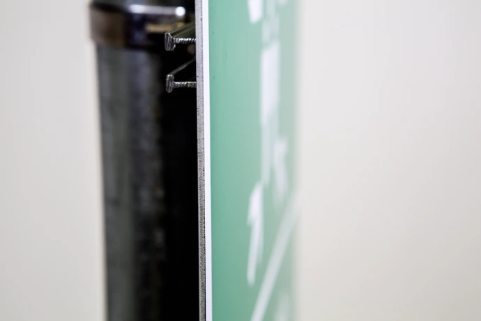 Side view of pole-mounted aluminium sign