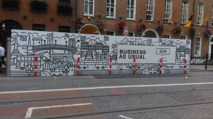 Construction site hoarding on street