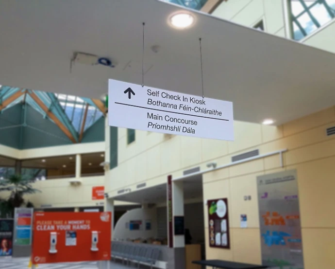 Internal hanging directional sign