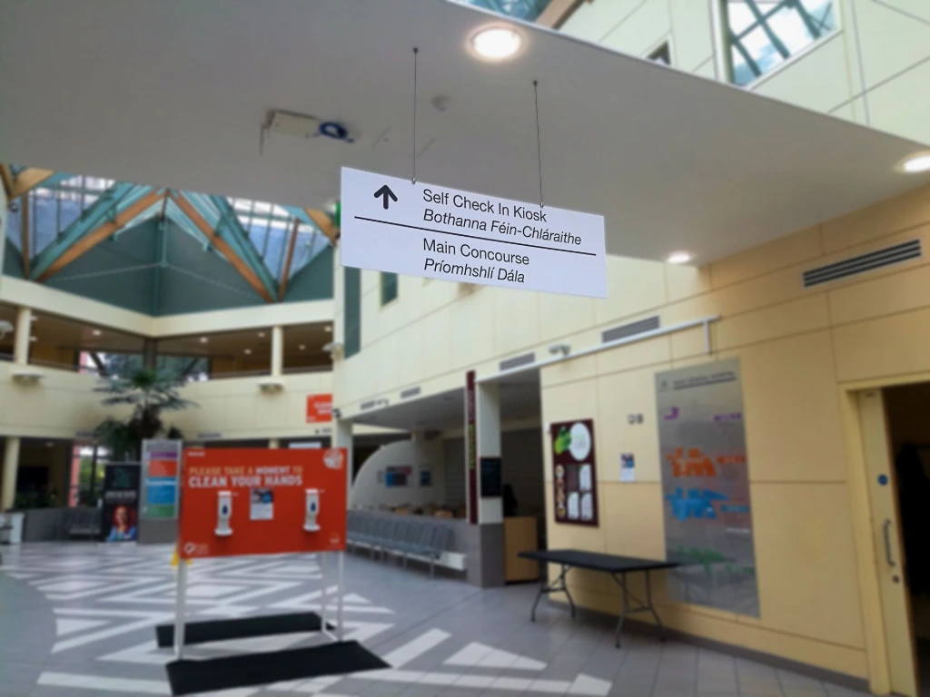 Hanging directional sign