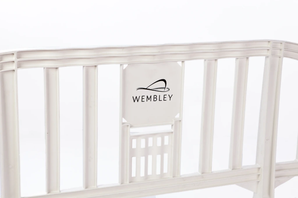 White pedestrian barrier with Wembley logo 